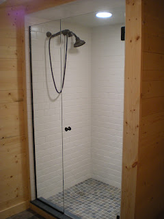Custom built tiled shower, 2x2 slate floor, https://huismanconcepts.com/