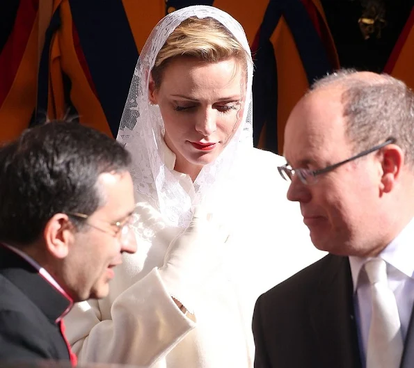 Princess Charlene of Monaco and Prince Albert II of Monaco arrives at the Apostolic Palace