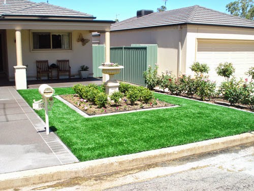 Front yard landscaping with grass and dwarf plants | Outdoor