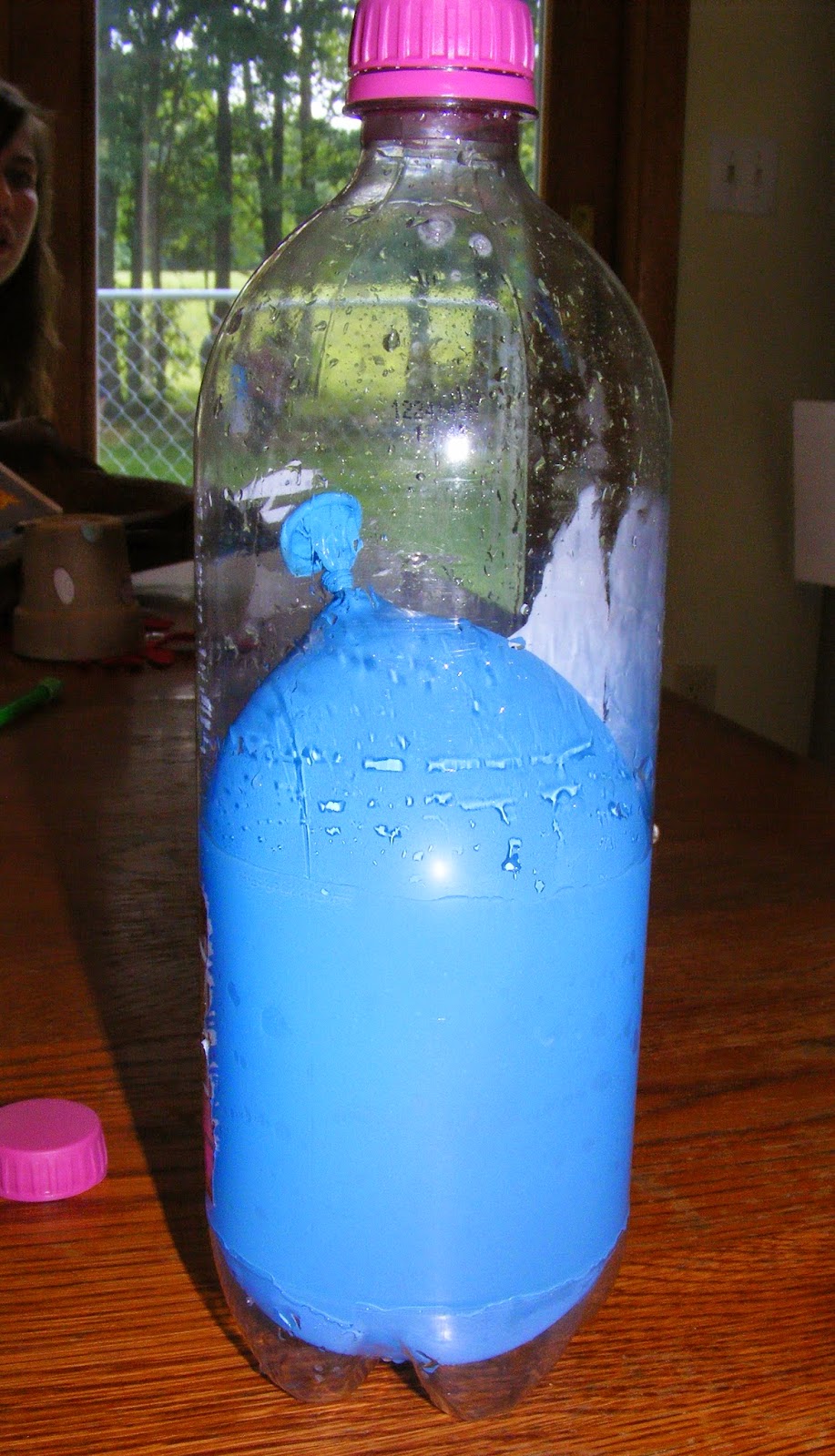 Ten kids and a Dog A Water Balloon in a Bottle