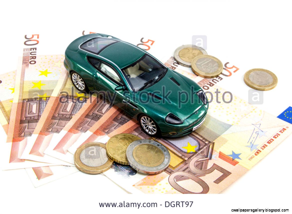 Toy Car With Euro Banknotes And Euro Coins Symbolic Image For Toy Car With Euro Banknotes And Euro Coins Symbolic Image For