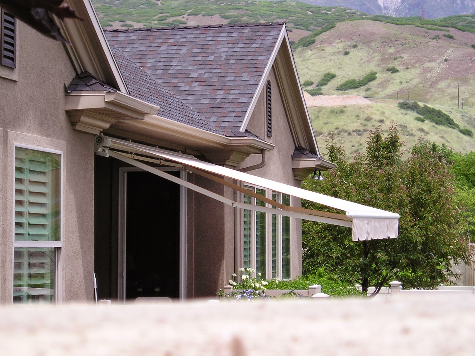 Huish's Awnings, Pergolas & More! Serving Utah Since 1936! Canvas Awnings & Retractables