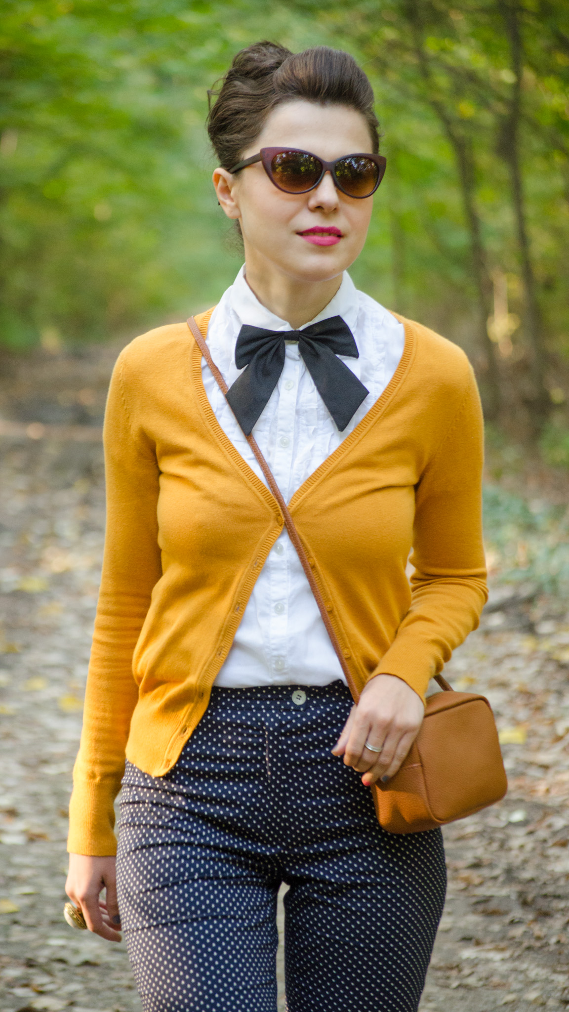 navy flares pants white shirt mustard sweater black bow-tie brown satchel bag koton C&A dotted cat-eye glasses mustard heels