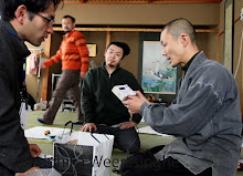 Japanese Buddhist monk sees the radiation level checking detector