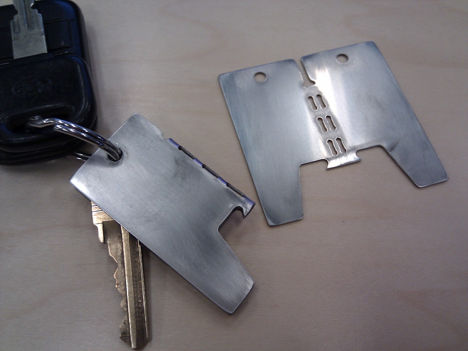 wong makes business card bottle opener now for sale