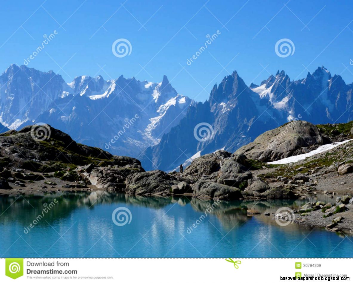 Beautiful Blue Lake In European Alps With Mont Blanc In The Beautiful Blue Lake In European Alps With Mont Blanc In The