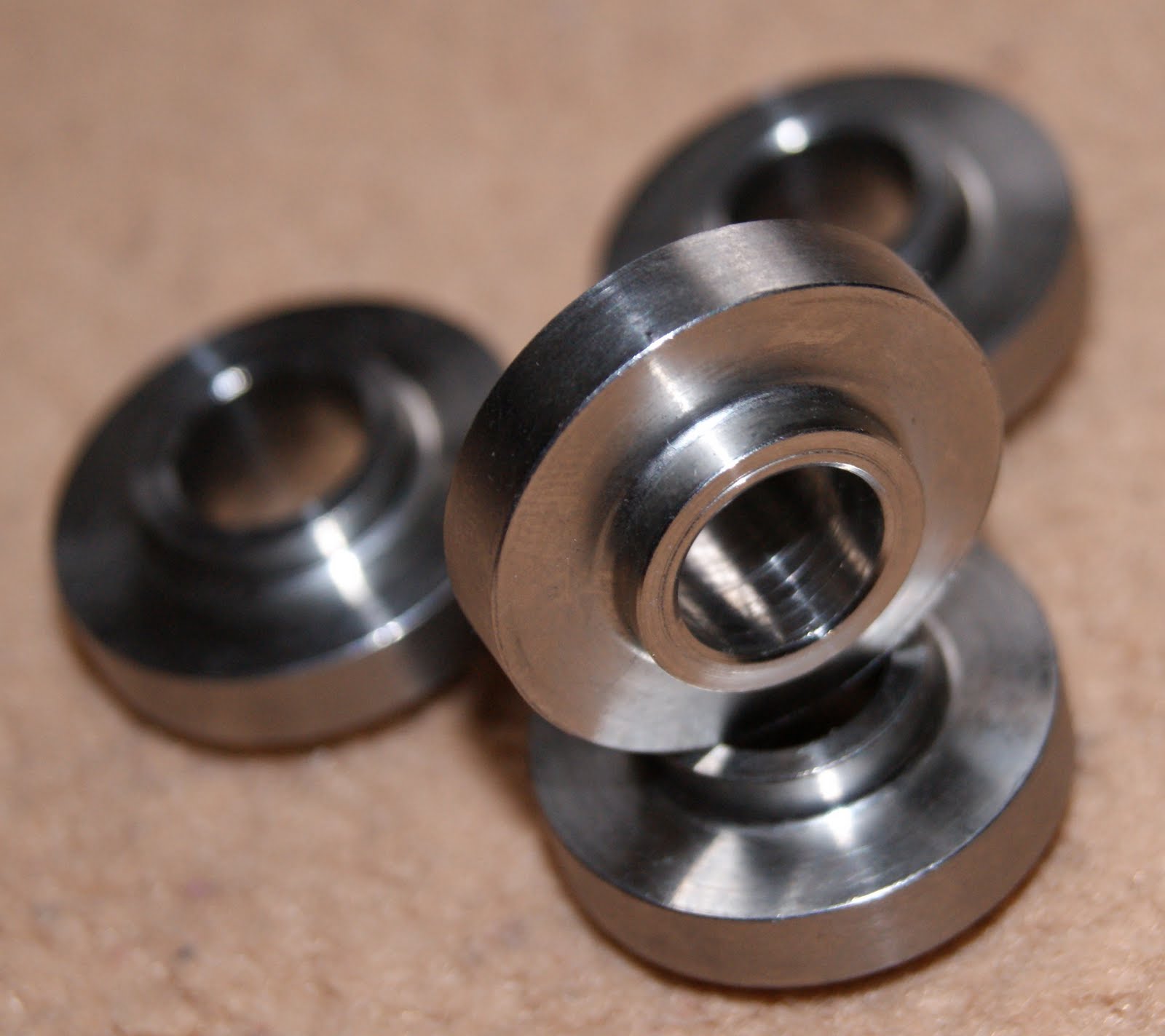 Titanium front caliper spacers