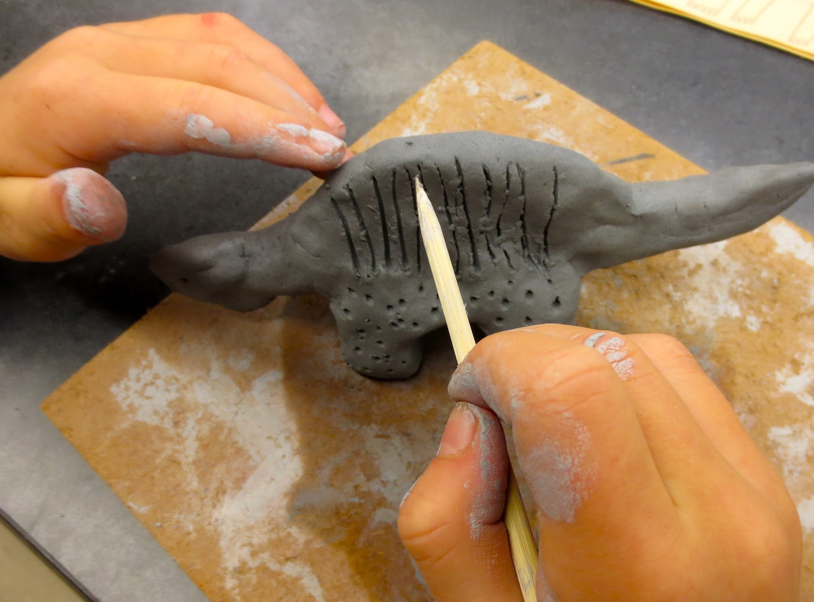 Zilker Elementary Art Class: 1st Grade Clay Dinosaur Sculptures