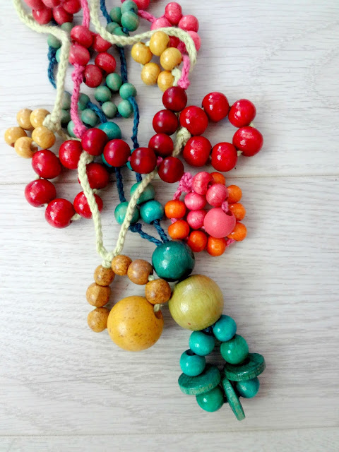 Tying and beading necklaces