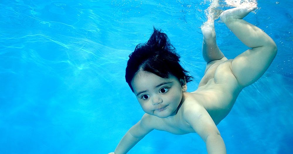 Amazing Underwater Swimming Babies by Phil Shaw.