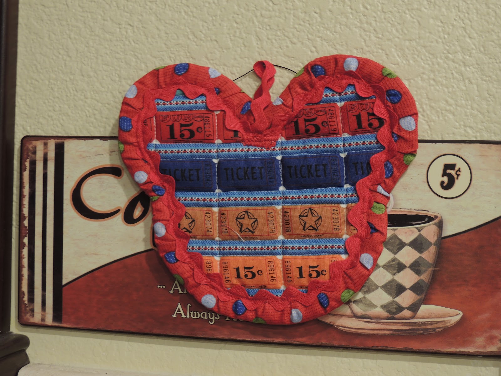 Seriously..I think it needs stitches. Mickey Mouse Hot Pad