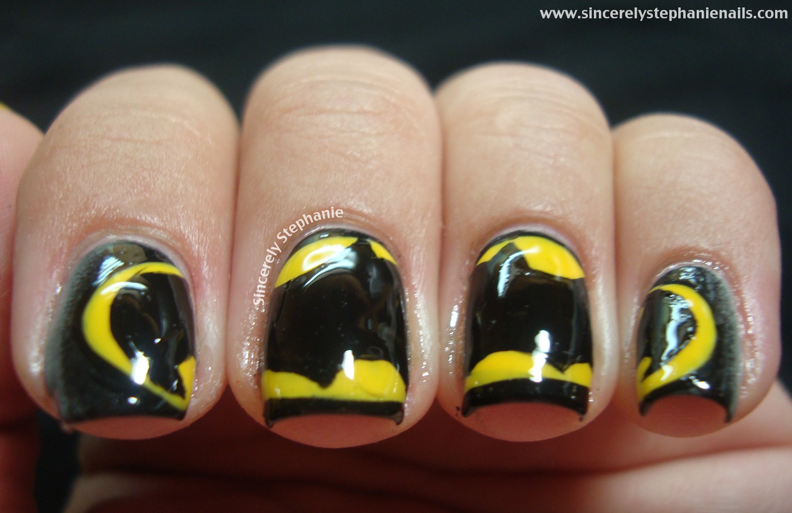 Easy peasy Batman nail art!
