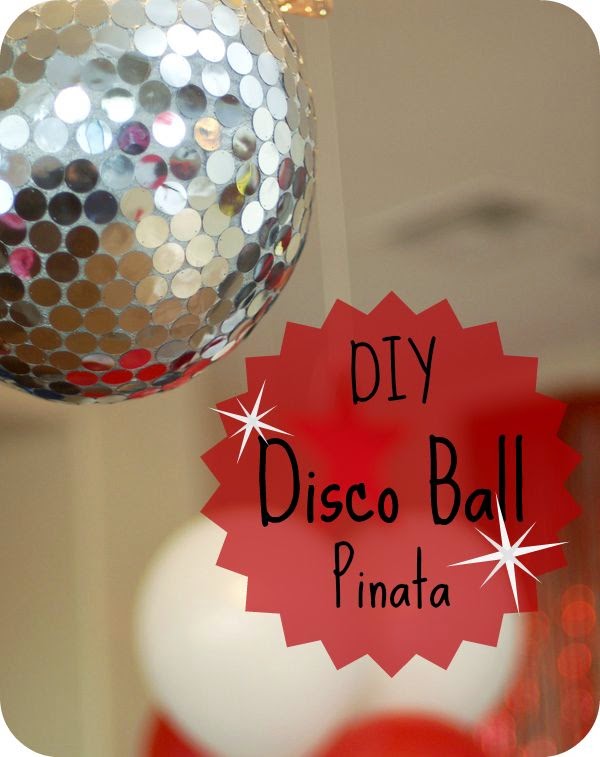 From Tikkido Make a Disco Ball Piñata with sequins..or maybe you could