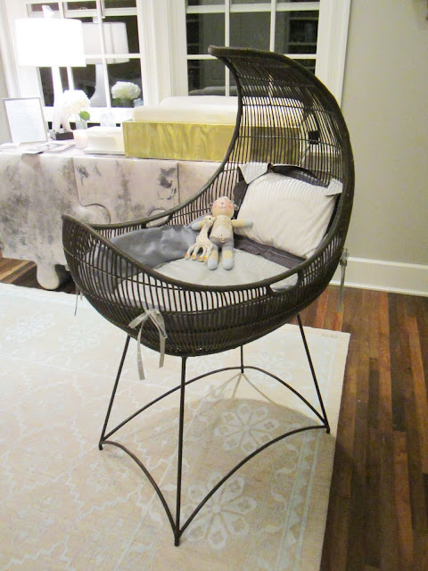 Close up of the crescent moon shaped bassinet from Kenneth Cobonpue's rattan furniture collection