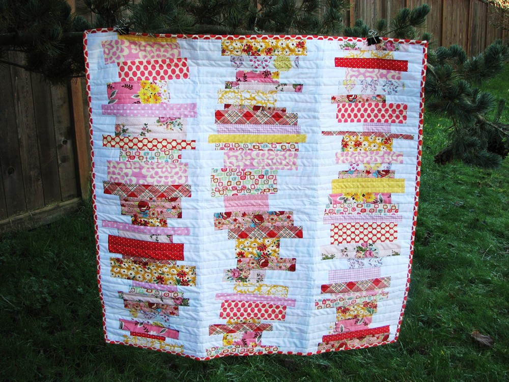 Cotton Studio Finished uneven coin block baby quilt