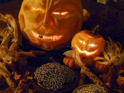 carved pumpkin jack o'lantern eats cookies