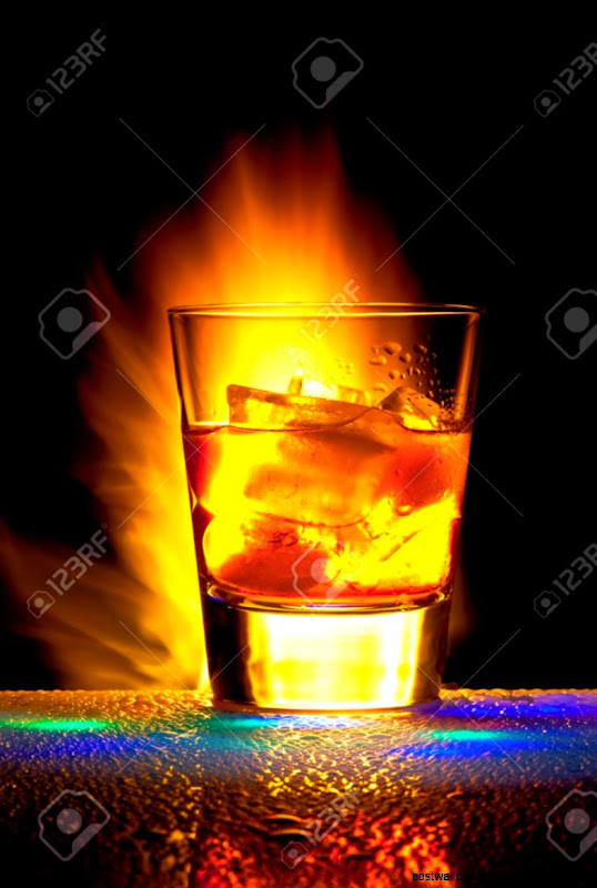 Glass With Against Bengal Fires With Reflexion In A Glass With Against Bengal Fires With Reflexion In A