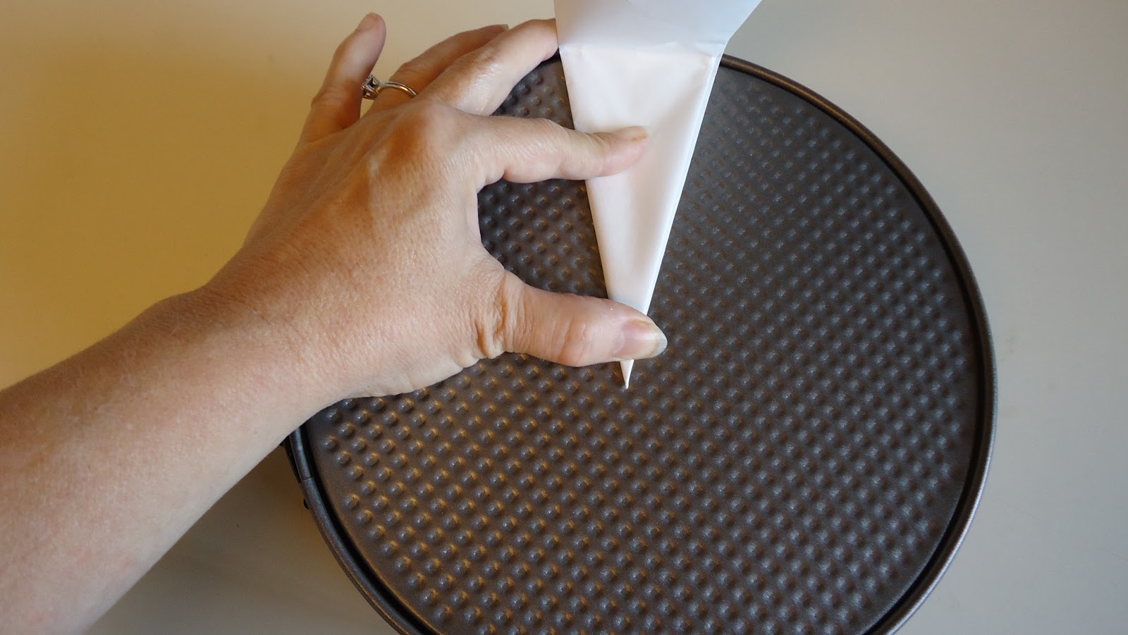 Unique Party Food to Go Cutting parchment paper to fit a round pan