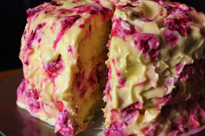 Raspberry Ripple and Lemon Cheesecake Cake with White Chocolate Cream Cheese Frosting