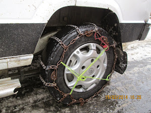 Jeep tyres "CHAIN LOCKED" to prevent slippage.