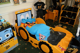 Ben all snuggled up in the JCB bed Ben all snuggled up in the JCB bed, JCB Kids