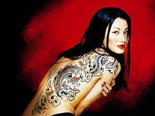Hot and Sexy Dragon Tattoos for girls Hot and sexy Designs of dragon tattoos for girls back with unique and interesting colors.