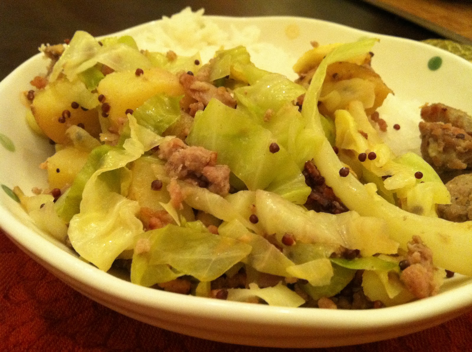 The Curried Cook Bangers N Mash with Cabbage (Island Style)