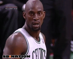 Animated gif of a black basketball player gripping his head and mouthing "are you serious?"