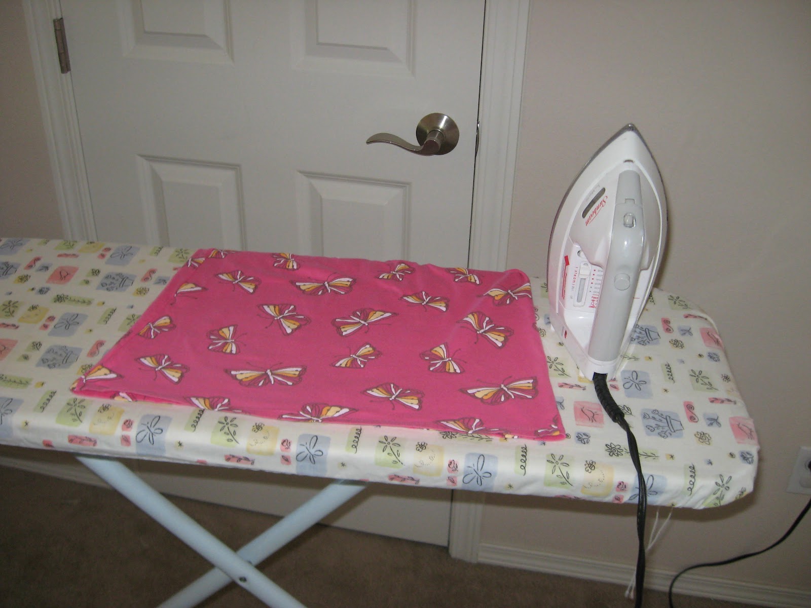 Sisters with Stuff Put a piece of foil UNDER your ironing board cover