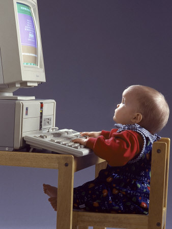 kevin-leigh-baby-sitting-at-desk-using-computer.jpg