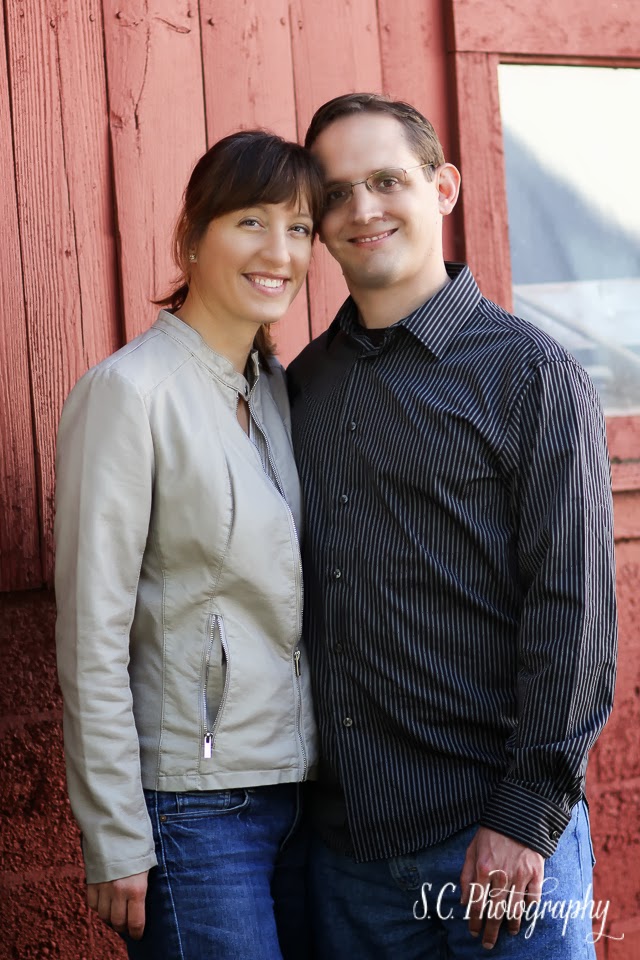 Red barn couple, engaged
