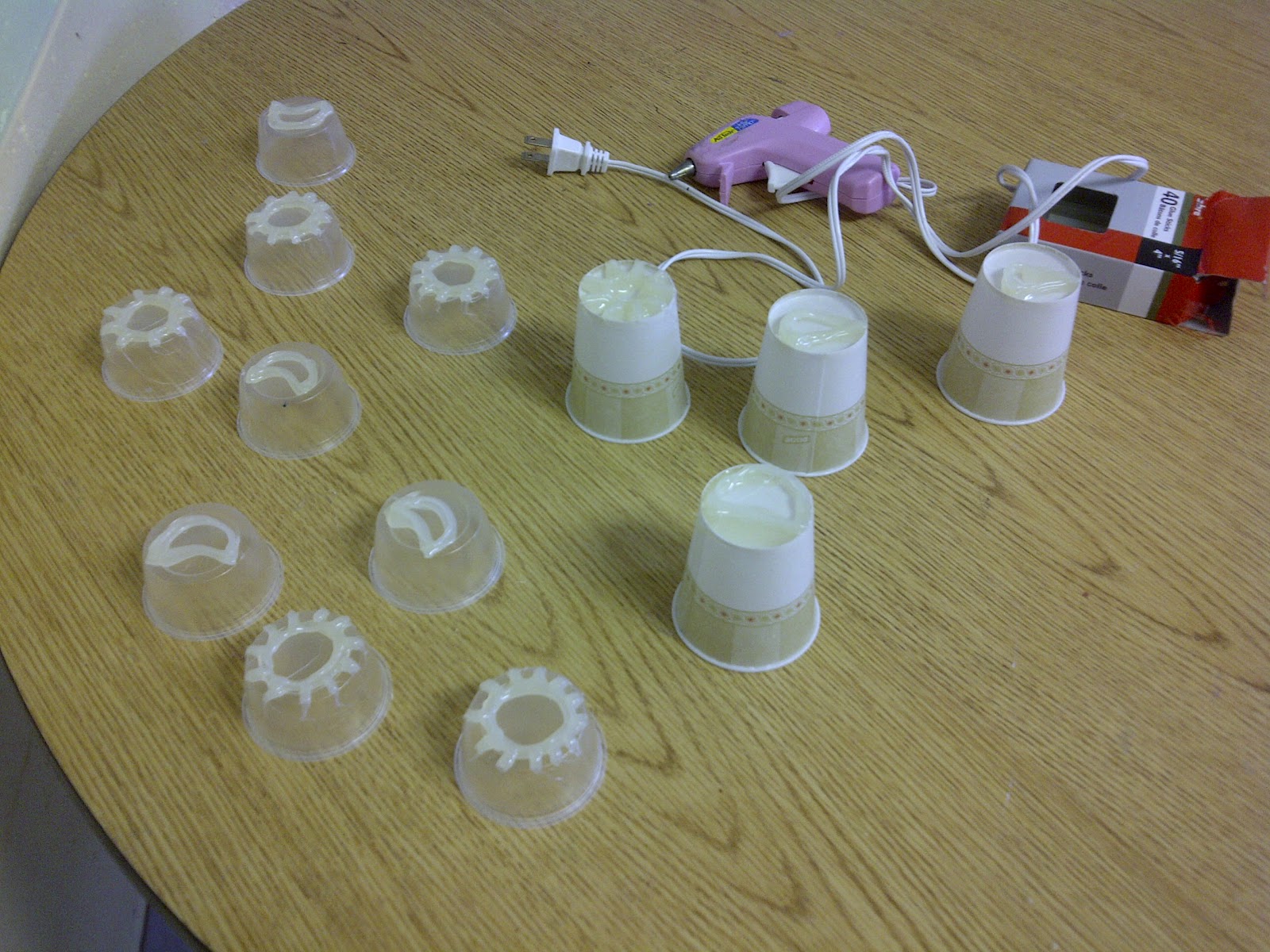 Pieces of String Stamps Using Plastic Cups and a Glue Gun.