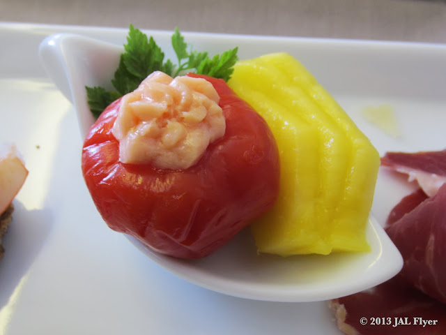 JAL First Class trip report on JL005: Amuse bouche -  Peppadew Pepper with Salmon Mousse & Mango