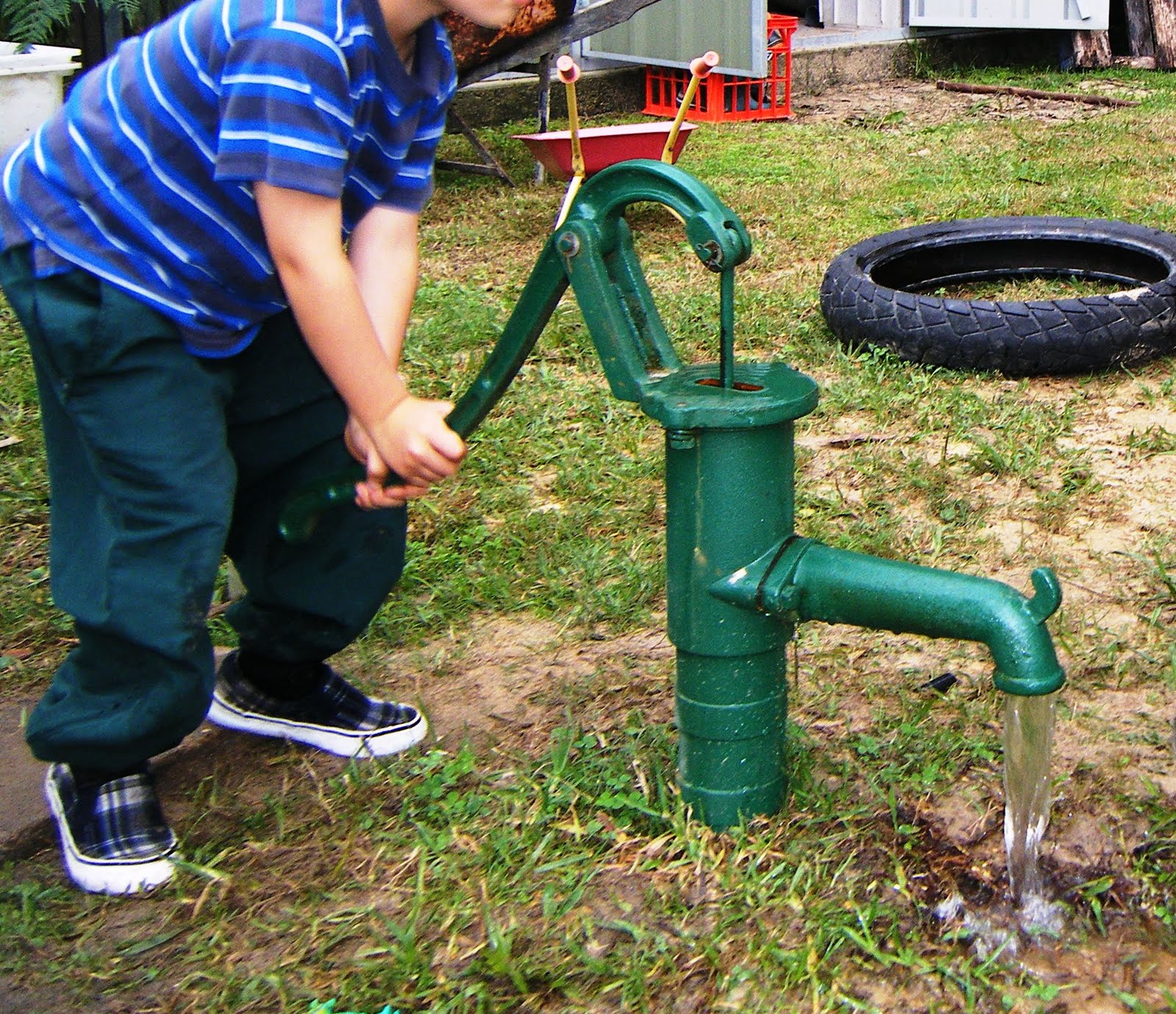 let the children play rain water tank + water pump = sustainable water