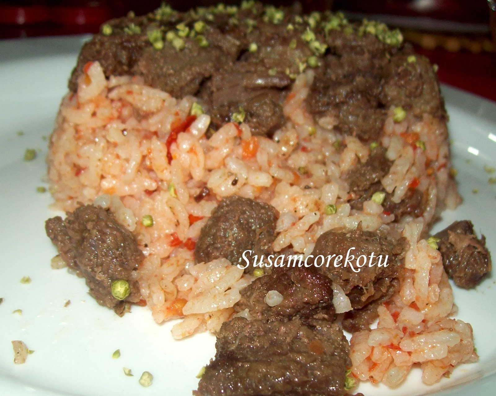 Domatesli Pirinç Pilavı Tarifi Domatesli Pirinç Pilavı Tarifi