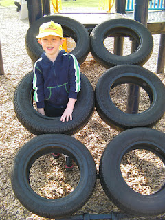 sloping car tyres construction climbing obstacle in playpark