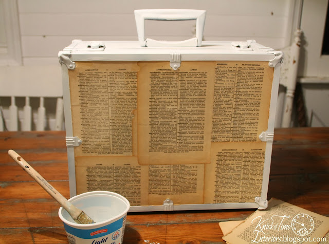 Repurposed Trunk Wall Cabinet by Knick of Time Repurposed Trunk into Wall Cabinet with Dictionary Pages and Framed Mirror by Knick of Time