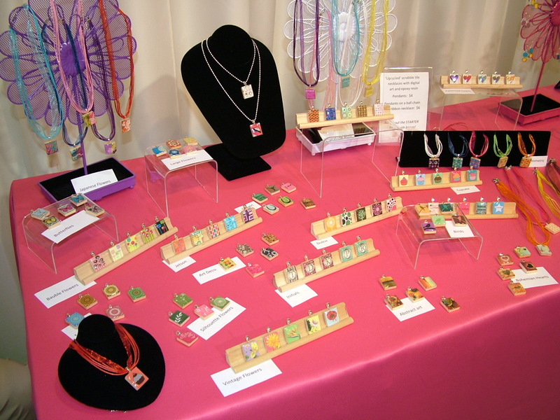 handmade resin jewelry by Katherine Swift Resin jewelry booth at ACRE