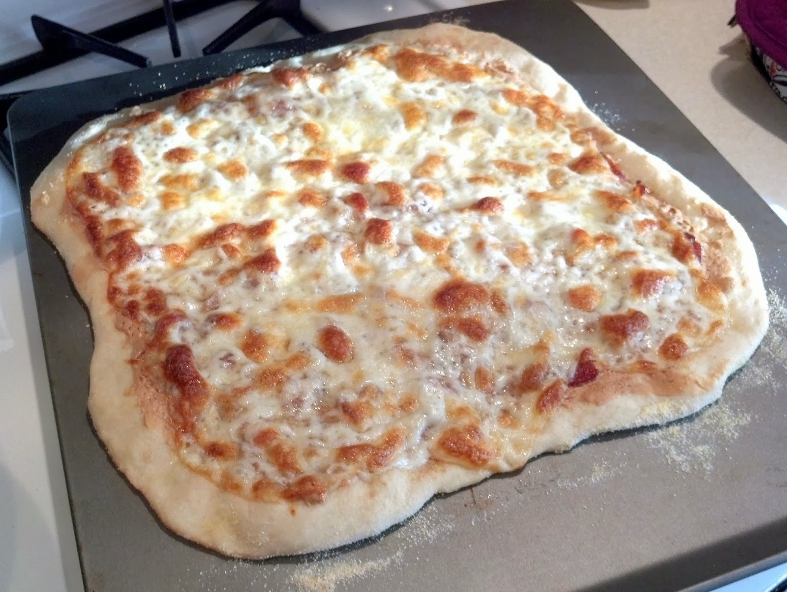 Sweet and Savory Shenanigans Peanut Butter Bacon Provolone Pizza