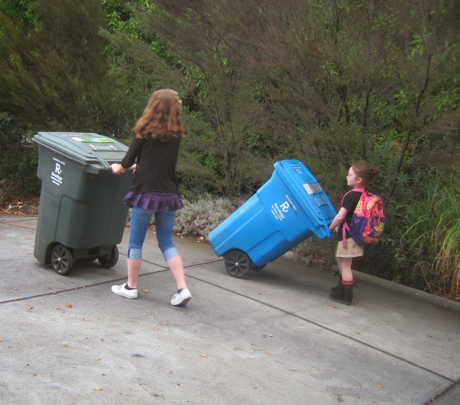 SQUIDALICIOUS The Intelligent Way Leo Hauls Trash Cans