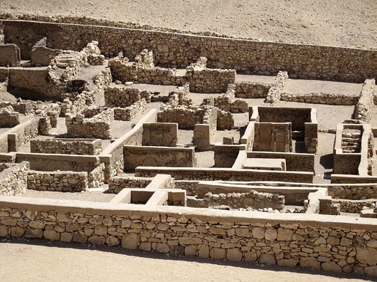 a dwelling site of the construction worker of a royal tomb: in Deir el-Medina, about the 13th century B.C.