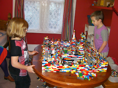 kids making giant lego castle