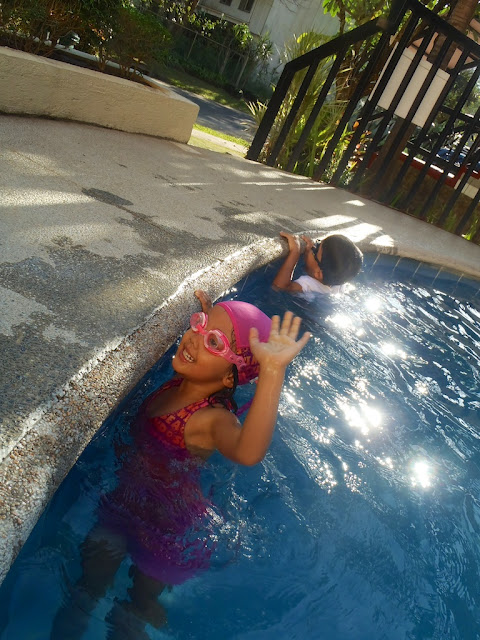 Kecil and friend in the swimming pool