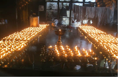 Mcleodganj, dharamsala, hill stations, buddhism, india, travel, Tibetan temple, lamps