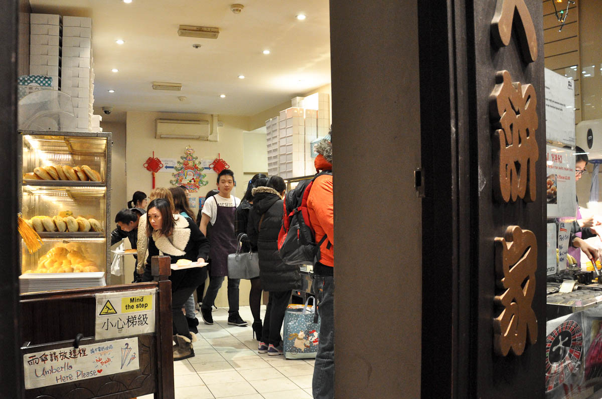 Through the door of a Chinese bakery, Chinatown, London, England