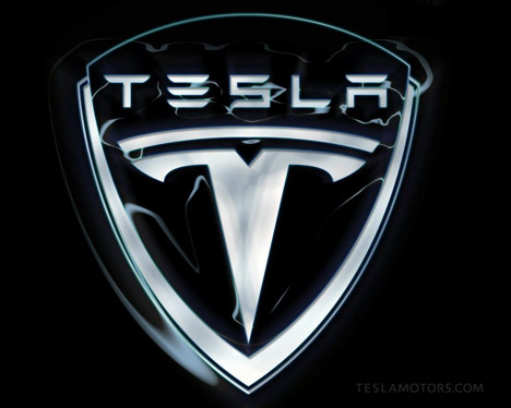 Tesla logo shaped UFO caught on ISS live feed camera Tesla-motors-logo-black-photo23