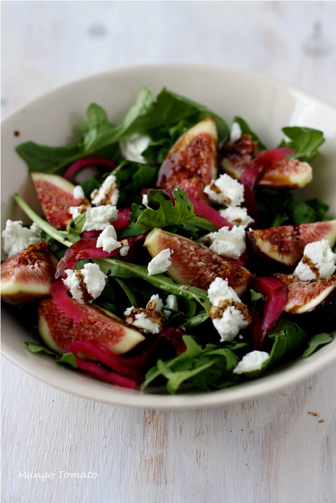 Mango & Tomato Fig salad with arugula, goat cheese and pickled onions