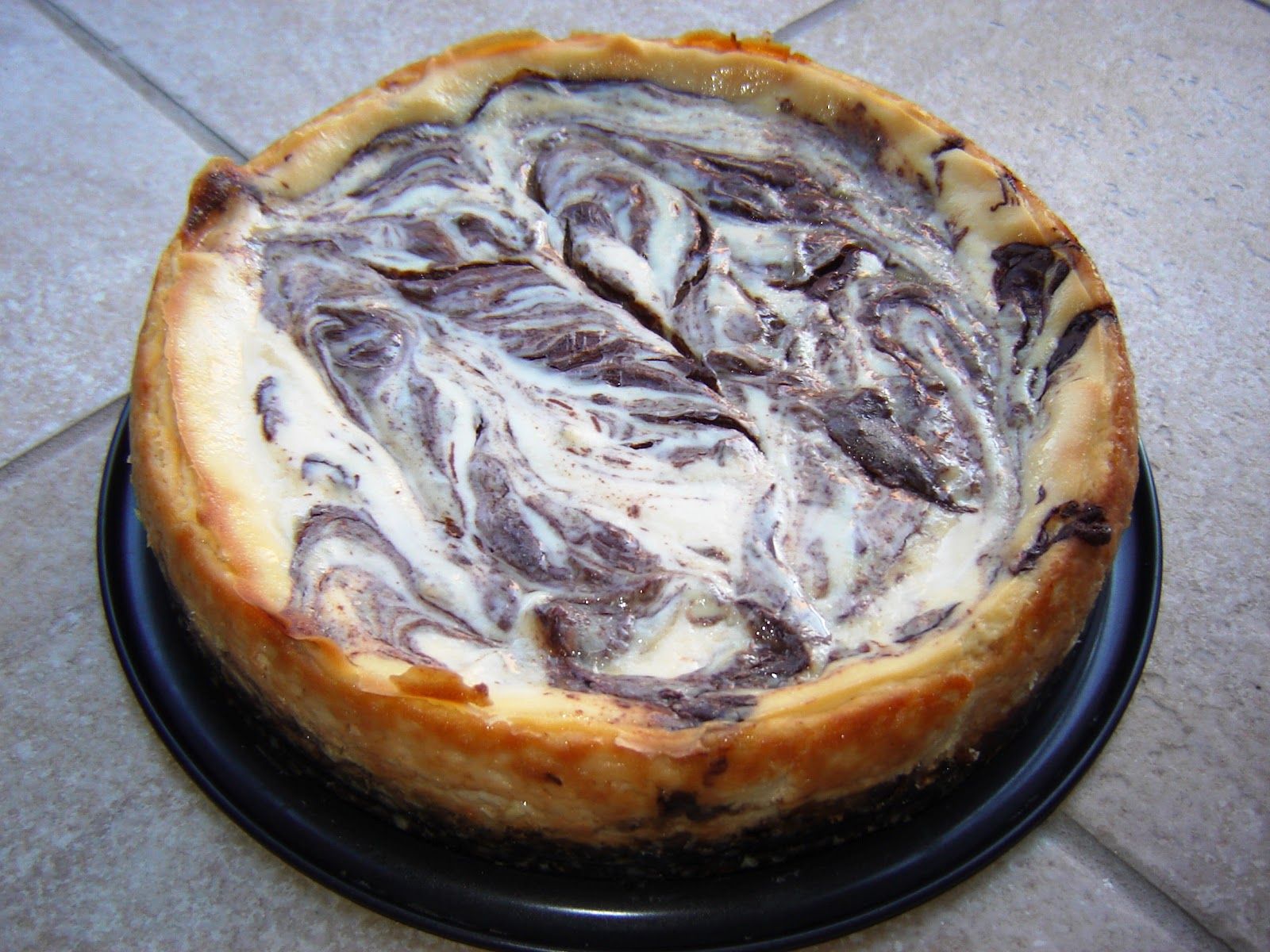 Dinner is Vegan Chocolate Swirl Cheesecake with Graham Cracker Cookie