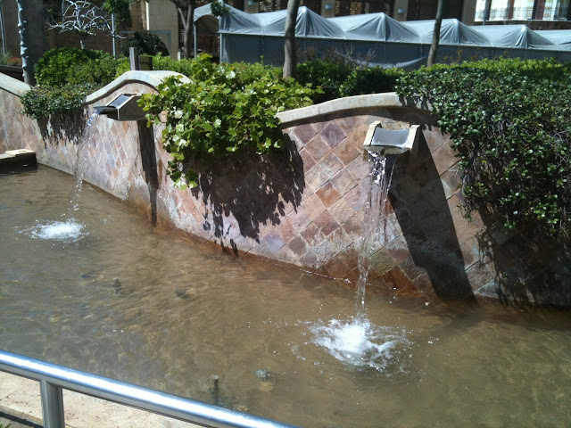 a water fountain with a couple of water jets