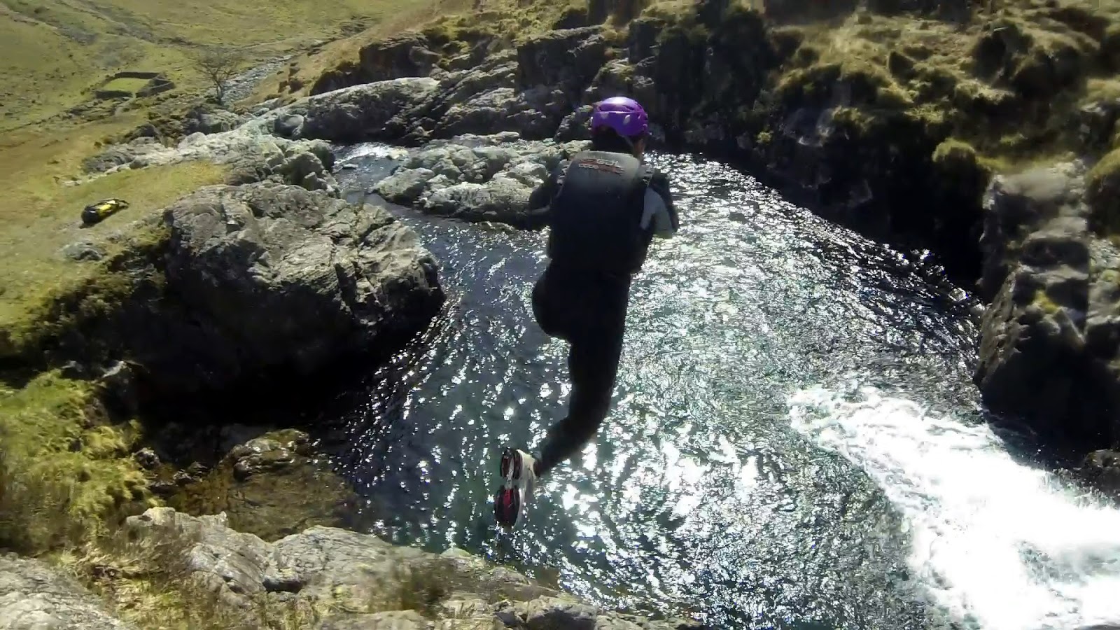 CANYONING in the crystal clear waters of the Esk in the LAKE DISTRICT